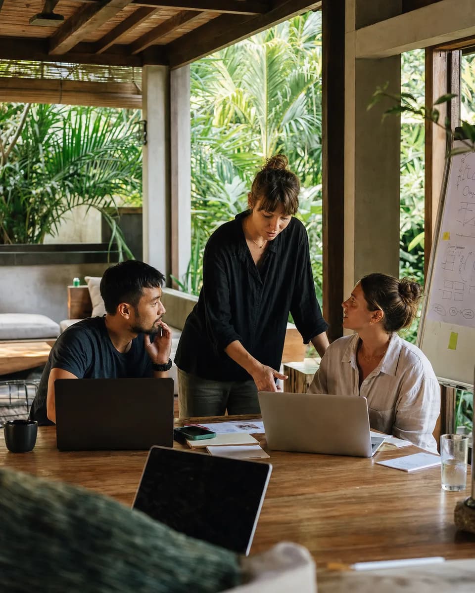 Founders building together in an open air Bali workspace